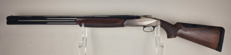 Photo 20260819_100440.jpg Fusil Superposé BENELLI 828 U Silver cal.12/76 + malette + boite à chokesx5 + cales de réglage de crosse